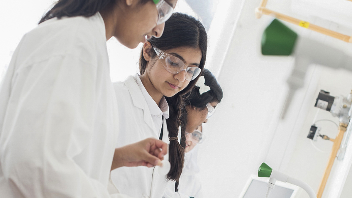 Group of secondary school pupils in a lab