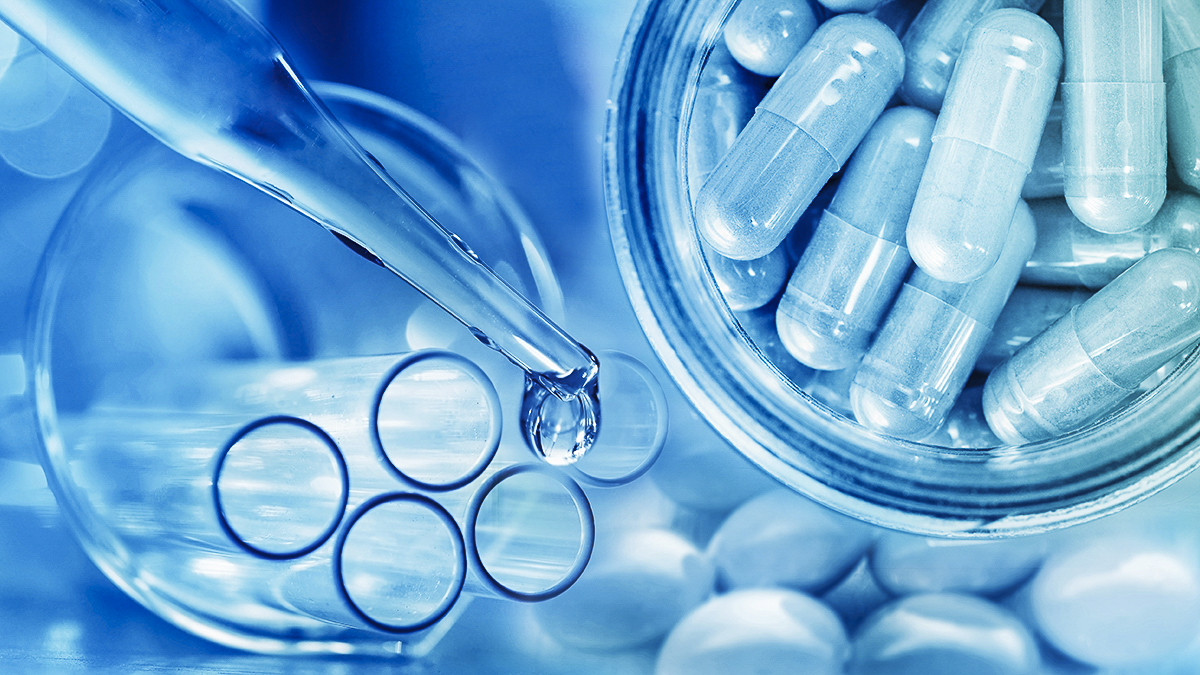 Beakers full of pills, test tubes and a pipette