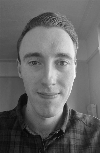 Headshot of Dr Ben Woolley