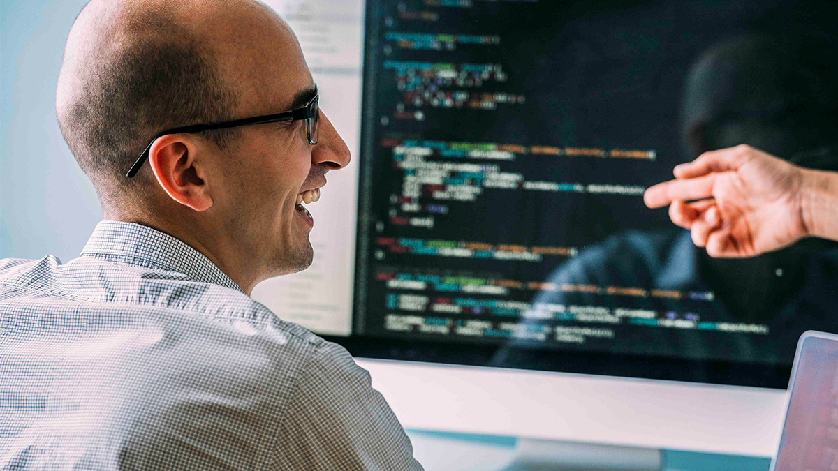 Two students discussing code